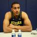 Michigan's Jordan Morgan looks up at a reporter during media day at the Player Development Center on Wednesday. Melanie Maxwell I AnnArbor.com